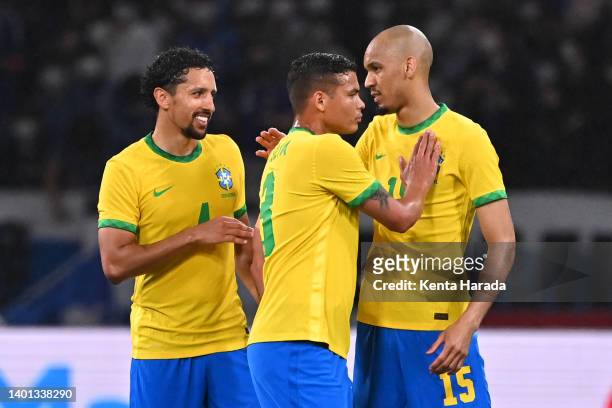 Marquinhos, Thiago Silva and Fabinho of Brazil celebrate their 1-0 victory in the international friendly match between Japan and Brazil at National...