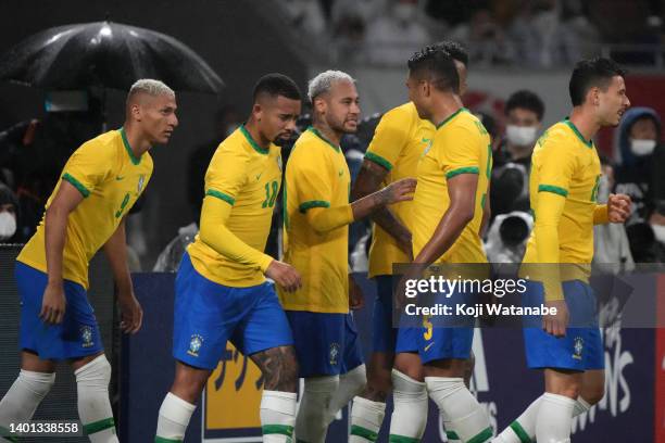 Neymar Jr. Of Brazil celebrates scoring his side's first goal with his teammates during the international friendly match between Japan and Brazil at...