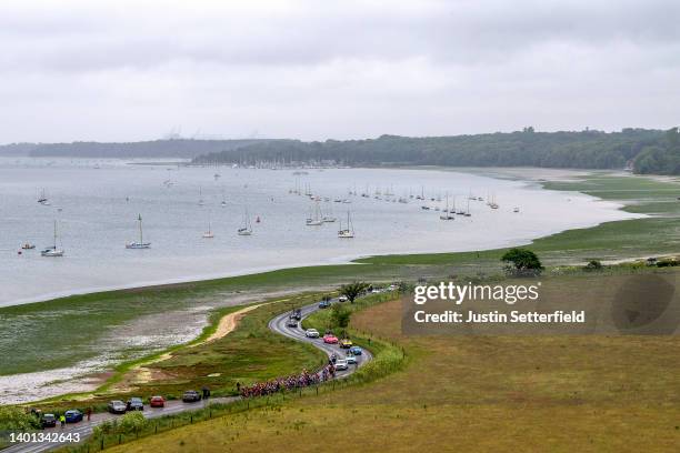 General view of the peloton passing through a landscape during the 8th The Women's Tour 2022 - Stage 1 stage from Colchester to Bury St Edmunds /...