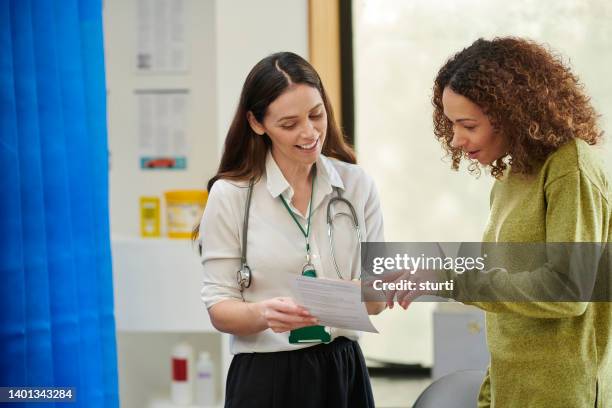 doctor's prescription - auscultation woman stock pictures, royalty-free photos & images