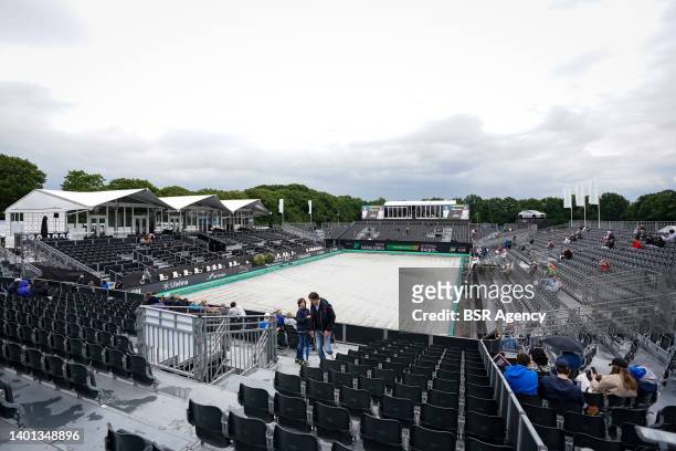 Centre court is covered due to a rain delay during Day 1 of the Libema Open Grass Court Championships at the Autotron on June 6, 2022 in...