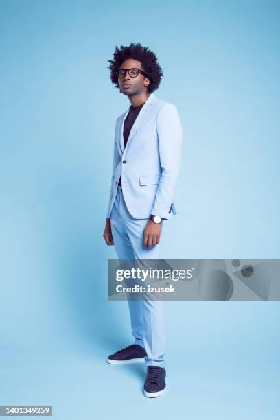 portrait of businessman standing - fashionable glasses stock pictures, royalty-free photos & images