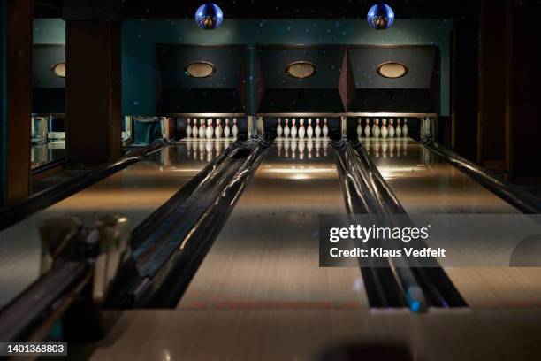 bowling pins arranged on lanes - bowling alley pins stock pictures, royalty-free photos & images