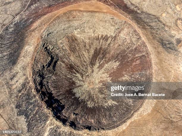 aerial view of the crater of a volcano in the canary islands. - caldera stock pictures, royalty-free photos & images