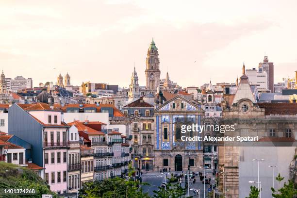 porto cityscape at sunset with tower of porto town hall in the center, portugal - porto district portugal stockfoto's en -beelden