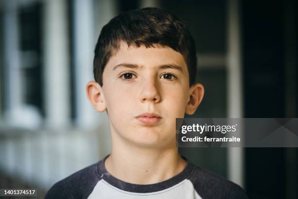 12 year old boy portrait - brown eyes stock pictures, royalty-free photos & images