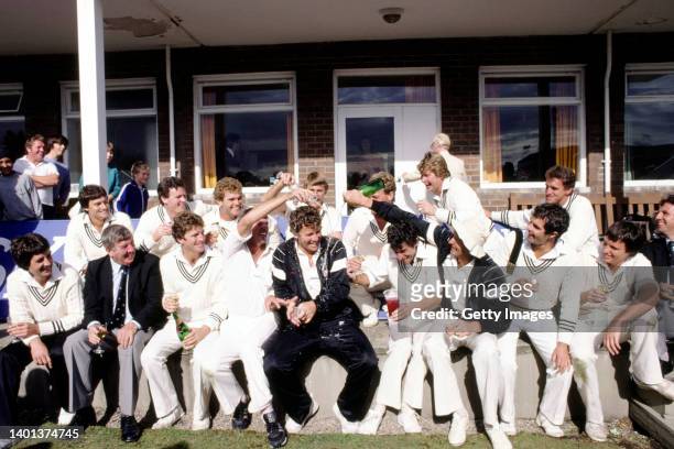 New Zealand all rounder and man of the match Lance Cairns is doused in champagne by team mates including captain Geoff Howarth and Jeremy Coney...