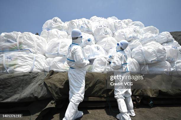 Customs officers inspect imported lithium carbonate at Longwu Branch Terminal of Shanghai İnternational Port Co., Ltd. On June 6, 2022 in Shanghai,...