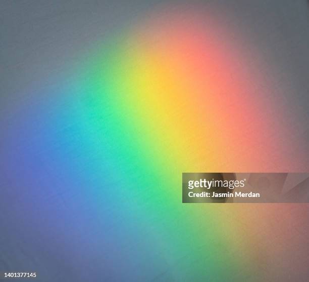 colors of the rainbow, refracted light pattern - iridescent stock-fotos und bilder