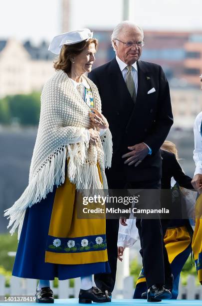 Queen Silvia of Sweden and King Carl XVI Gustaf of Sweden participate in a ceremony celebrating Sweden's national day at Skansen on June 06, 2022 in...