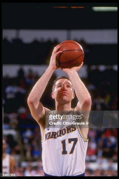 Forward Chris Mullin of the Golden State Warriors prepares to shoot the basketball during a game against the New York Knicks. Mandatory Credit: Otto...