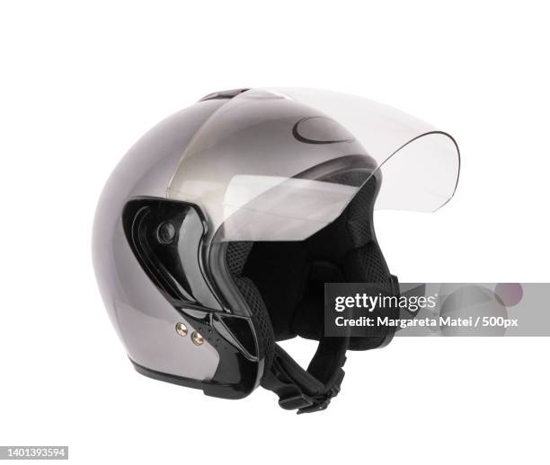 close-up of helmet against white background - crash helmet fotografías e imágenes de stock