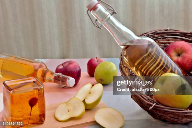 the sun in a glass is cider - aceto foto e immagini stock