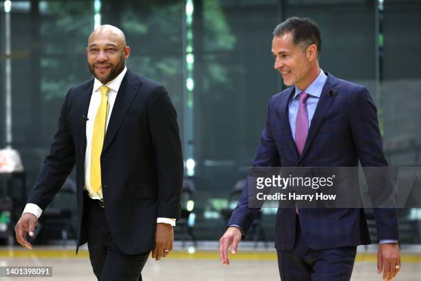 Los Angeles Lakers Head Coach Darvin Ham enters with Vice President of Basketball Operations Rob Pelinka before the introductory press conference at...