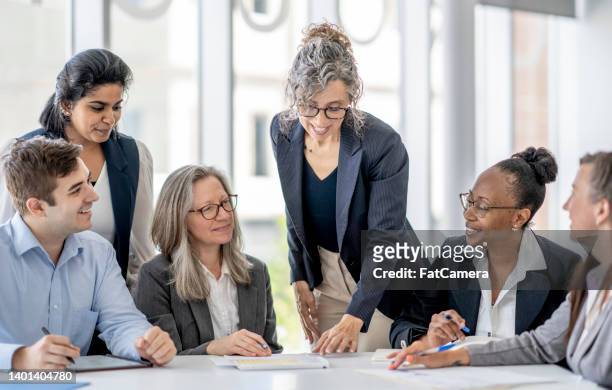 small business meeting - team performance stock pictures, royalty-free photos & images