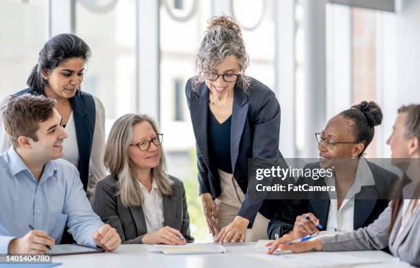 small business meeting - office small business teamwork stock pictures, royalty-free photos & images