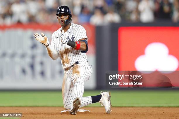 Miguel Andujar of the New York Yankees reacts after reaching second base during the eighth inning of Game Two of a doubleheader against the Los...