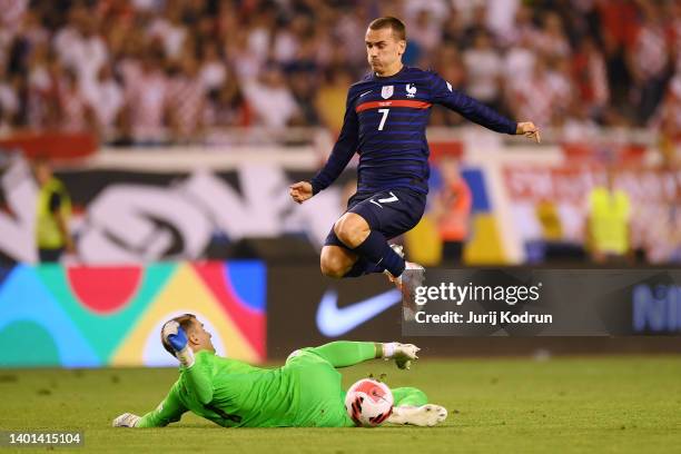 Antoine Griezmann of France is challenged by Dominik Livakovic of Croatia during the UEFA Nations League League A Group 1 match between Croatia and...