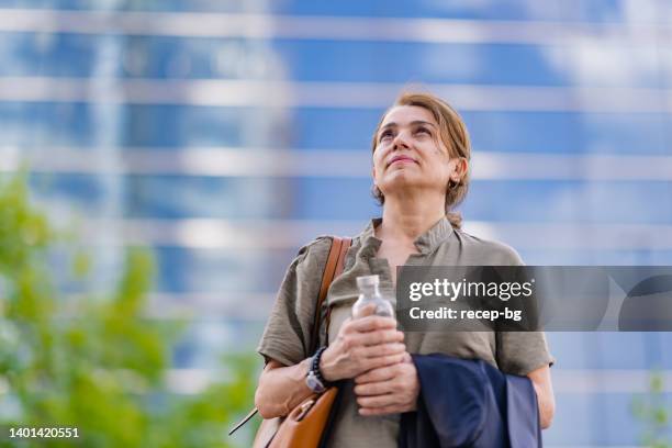 portrait of businesswoman - glass bottle white bg stock pictures, royalty-free photos & images