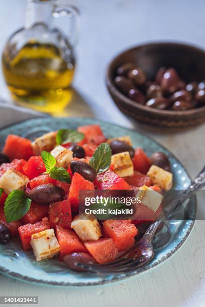 watermelon salad with grilled halloumi cheese - grilled halloumi stock pictures, royalty-free photos & images