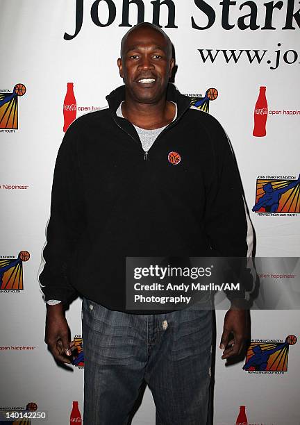 Former NBA player and present assistant coach with the New York Knicks Herb Williams poses for a photo during the John Starks Foundation Celebrity...