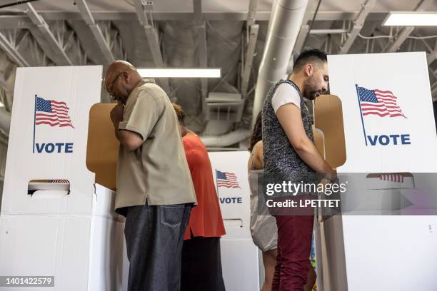 people voting - voting machine stock pictures, royalty-free photos & images