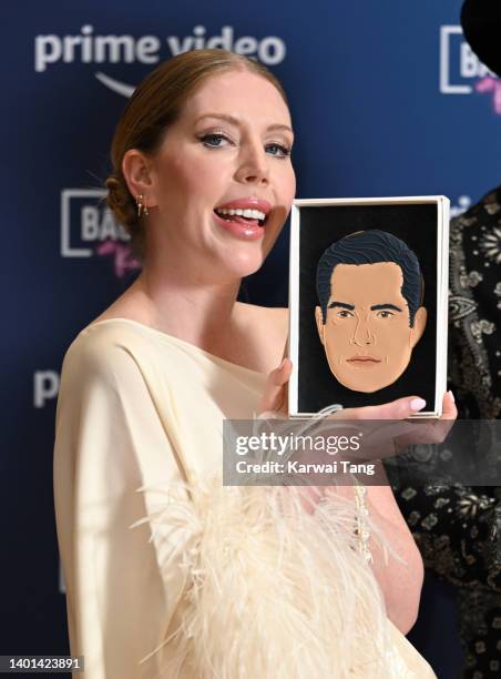 Katherine Ryan holds up a drawing of Jimmy Carr at the launch of Prime Video's "Backstage With Katherine Ryan" at BAFTA on June 06, 2022 in London,...