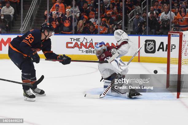 Ryan Nugent-Hopkins of the Edmonton Oilers scores a goal against Pavel Francouz of the Colorado Avalanche during the second period in Game Four of...