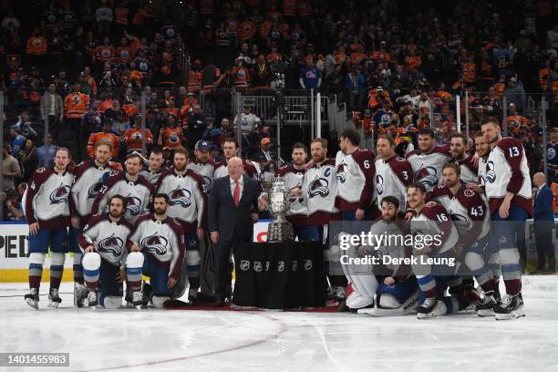 The Colorado Avalanche pose with the Clarence S. Campbell Bowl after defeating the Edmonton Oilers 6-5 in overtime in Game Four of the Western...