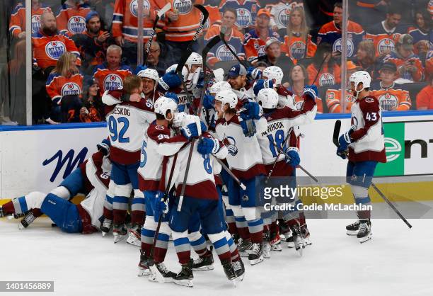 The Colorado Avalanche celebrate after a goal was scored by Artturi Lehkonen to defeat the Edmonton Oilers 6-5 in overtime in Game Four of the...