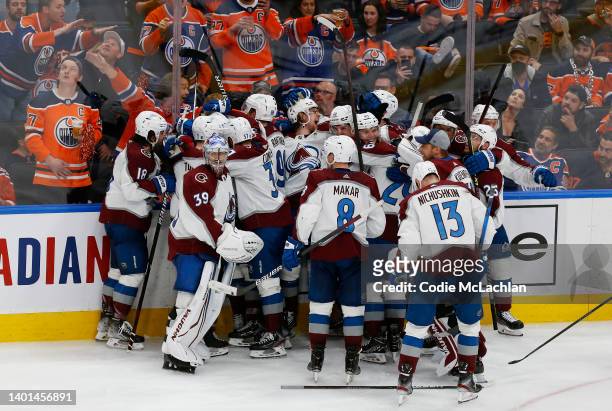 The Colorado Avalanche celebrate after a goal was scored by Artturi Lehkonen to defeat the Edmonton Oilers 6-5 in overtime in Game Four of the...