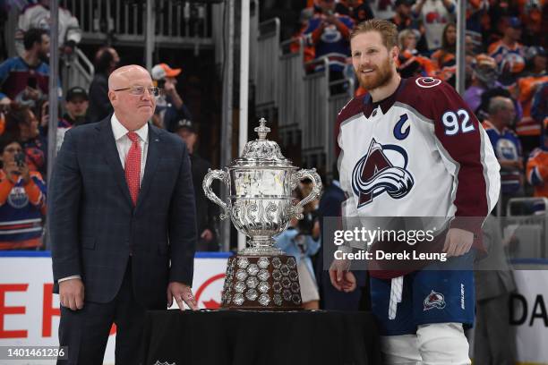 Gabriel Landeskog of the Colorado Avalanche poses for a photo with Deputy Commissioner Bill Daly before the presentation of the Clarence S. Campbell...