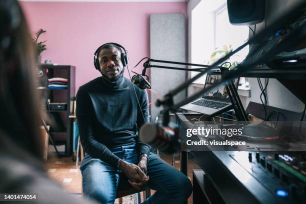 entrepreneur interviewed on a podcast - radio equalizer stock pictures, royalty-free photos & images