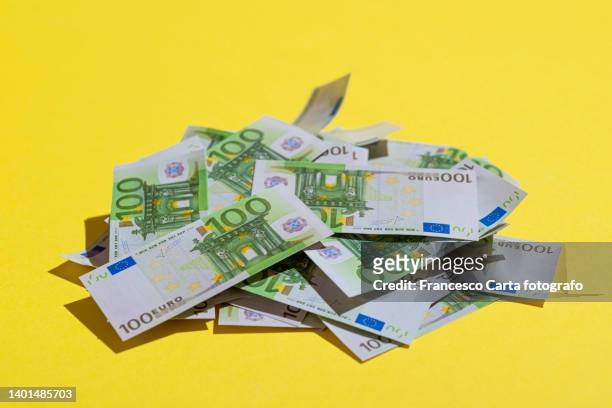 heap of money - euro money stockfoto's en -beelden
