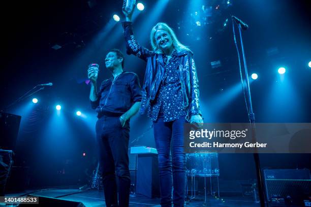 Jamie Hince and Alison Mosshart of the band The Kills greet fans on stage at The Mayan on June 06, 2022 in Los Angeles, California.