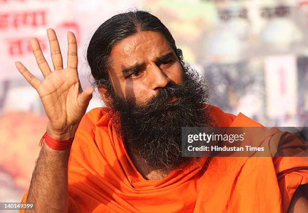 Yoga guru Baba Ramdev addressing press conference after Supreme Court Verdict on Ramlila Maidan lathi Charge case at Ram Jethmalani's residence on...