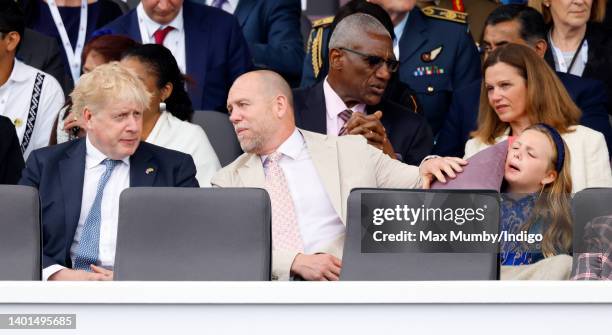 Prime Minister Boris Johnson, Mike Tindall and Mia Tindall attend the Platinum Pageant on The Mall on June 5, 2022 in London, England. The Platinum...