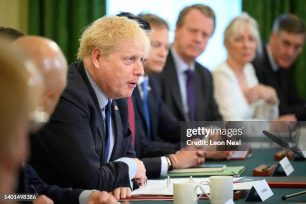 Britain's Prime Minister Boris Johnson addresses his Cabinet ahead of the weekly Cabinet meeting in Downing Street on June 07, 2022 in London,...