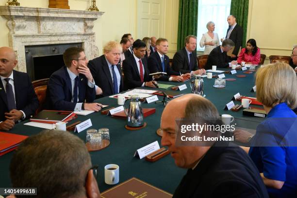 Britain's Prime Minister Boris Johnson prepares to address his Cabinet ahead of the weekly Cabinet meeting in Downing Street on June 07, 2022 in...
