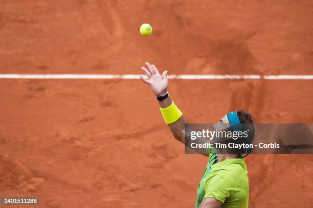 Rafael Nadal of Spain serving against Casper Rudd of Norway during the Singles Final for Men on Court Philippe Chatrier at the 2022 French Open...