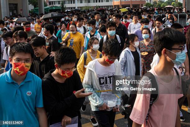 Students leave the examination room after finishing the first Chinese national college entrance exam on June 7, 2022 in Wuhan, Hubei province, China....