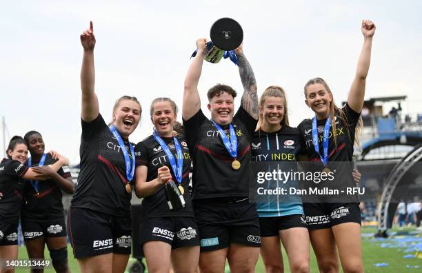 Cara Wardle, Ella Wyrwas, Hannah Botterman, Zoe Harrison and Holly Aitchison of Saracens celebrate with the trophy following the Allianz Premier 15s...