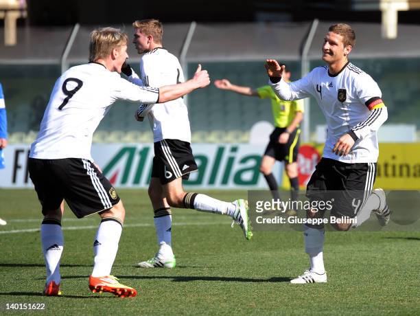 Shkodran Mustafi of Germany celebrates after scoring during the U20 Italy v U20 Germany - International Friendly on February 29, 2012 in Foggia,...