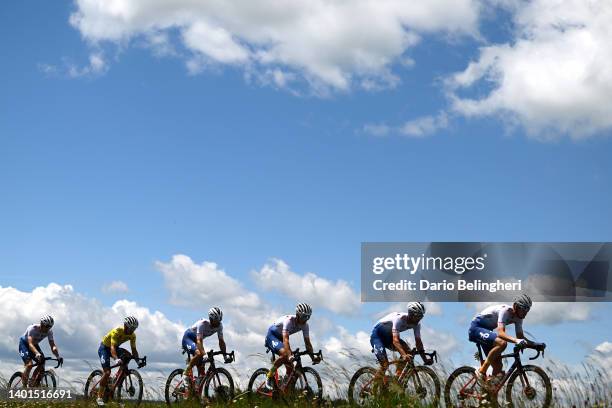 Alexis Vuillermoz of France and Team Total Energies Yellow Leader Jersey with teammates compete during the 74th Criterium du Dauphine 2022 - Stage 3...