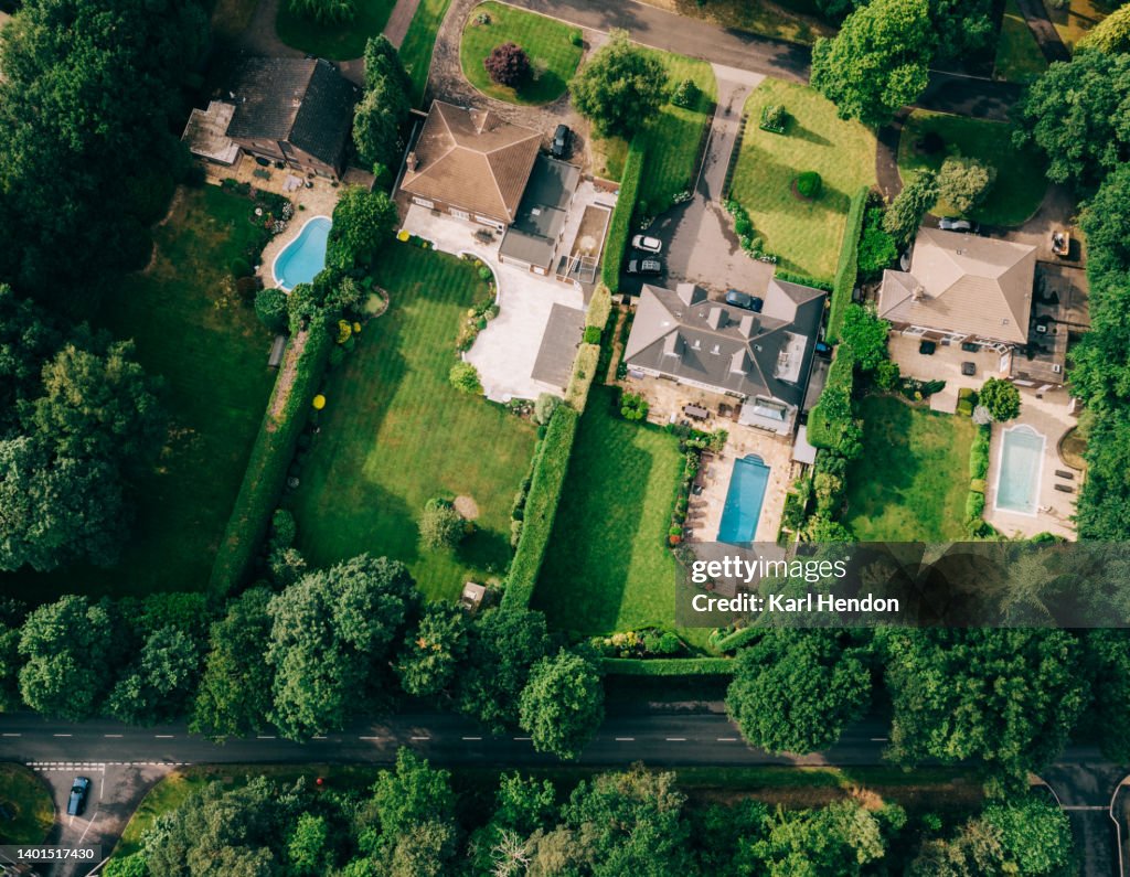 An aerial view of suburban houses in Surrey, UK