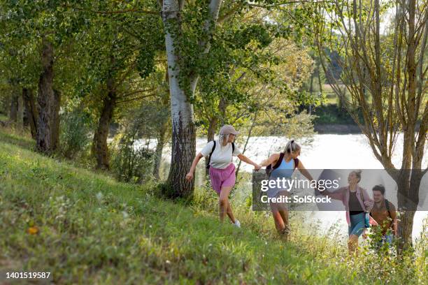 a helping hand - montauban stock pictures, royalty-free photos & images