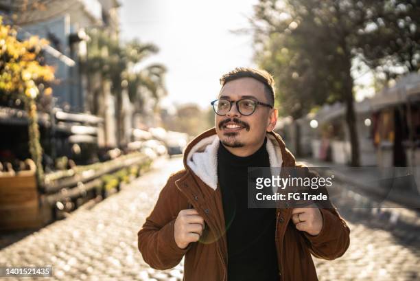 happy young man exploring city - buenos aires city stock pictures, royalty-free photos & images