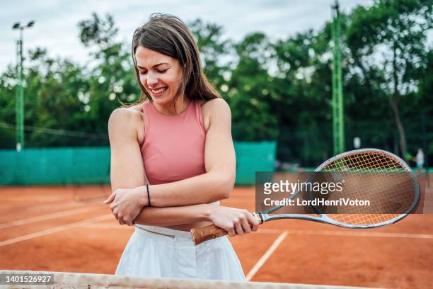 elbow injury in tennis - sports pain bildbanksfoton och bilder