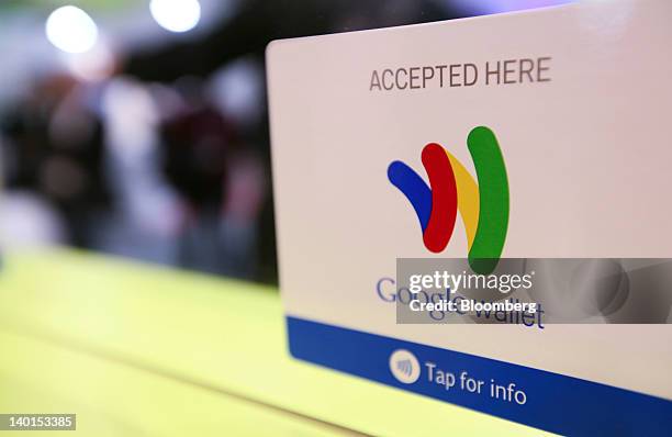 The Google Inc. Mobile Wallet card for cardless payment sits on display at the Mobile World Congress in Barcelona, Spain, on Wednesday, Feb. 29,...