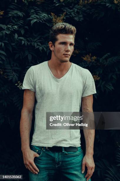 portrait of young handsome men outdoors - three quarter length stock pictures, royalty-free photos & images